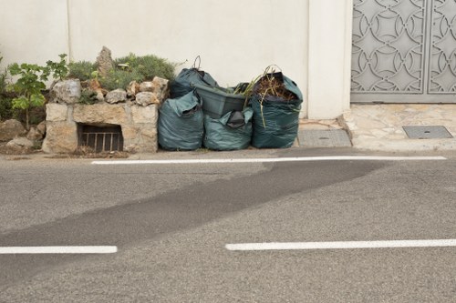 Front view of commercial waste bins at a business premises