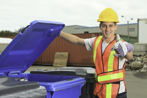 Manager conducting a compliance review at a waste facility